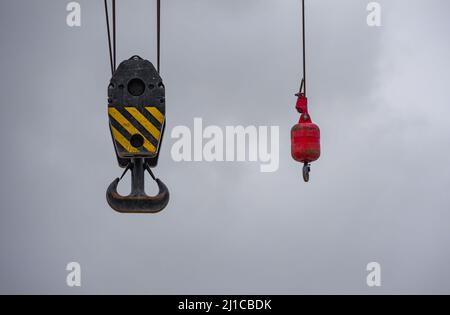 Two hooks attached to crane system in downtown Seattle. Stock Photo