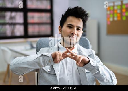 Adult Learning Sign Language For Deaf Disabled Stock Photo