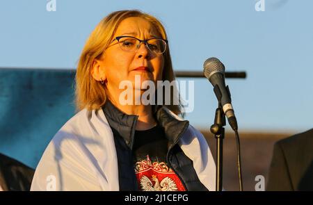 Polish Ambassador to Ireland Anna Sochanska speaks outside the Russian Embassy in south Dublin where large crowds have gathered to mark one month since the invasion of Ukraine. The embassy has become the focal point for Irish anger over the war raged by Vladimir Putin and the latest demonstration was organised by the Irish Congress of Trade Unions (ICTU). Picture date: Thursday March 24, 2022. Stock Photo