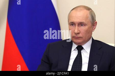 Moscow, Russia. 23rd Mar, 2022. Russian President Vladimir Putin chairs a cabinet meeting with government officials via video conference from the official state residence at Novo-Ogaryovo, March 23, 2022 outside Moscow, Russia. Credit: Mikhael Klimentyev/Kremlin Pool/Alamy Live News Stock Photo