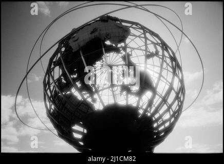 Silhouetted Unisphere globe sculpture in Flushing Meadows Corona Park, Queens created for 1964 Worlds Fair, New York City, New York, USA Stock Photo