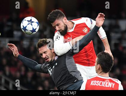 LONDON, ENGLAND - MARCH 7, 2017: Mats Hummels (L) of Bayern and Olivier Giroud (R) of Arsenal pictured in action during the second leg of the UEFA Champions League Round of 16 game between Arsenal FC and Bayern Munchen at Emirates Stadium. Copyright: Cosmin Iftode/Picstaff Stock Photo