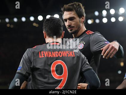 LONDON, ENGLAND - MARCH 7, 2017: Mats Hummels congratulates Robert Lewandowski of Bayern after he scored a goal during the second leg of the UEFA Champions League Round of 16 game between Arsenal FC and Bayern Munchen at Emirates Stadium. Copyright: Cosmin Iftode/Picstaff Stock Photo