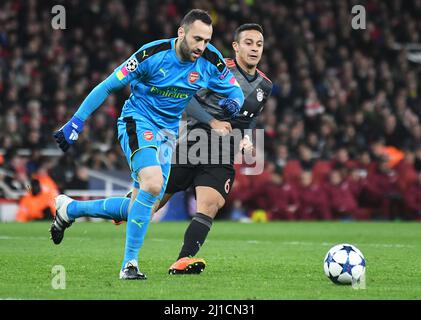 LONDON, ENGLAND - MARCH 7, 2017: David Ospina (L) of Arsenal and Thiago Alcantara (R) of Bayern pictured in action during the second leg of the UEFA Champions League Round of 16 game between Arsenal FC and Bayern Munchen at Emirates Stadium. Copyright: Cosmin Iftode/Picstaff Stock Photo