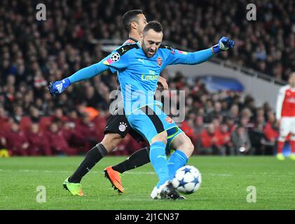 LONDON, ENGLAND - MARCH 7, 2017: David Ospina (L) of Arsenal and Thiago Alcantara (R) of Bayern pictured in action during the second leg of the UEFA Champions League Round of 16 game between Arsenal FC and Bayern Munchen at Emirates Stadium. Copyright: Cosmin Iftode/Picstaff Stock Photo