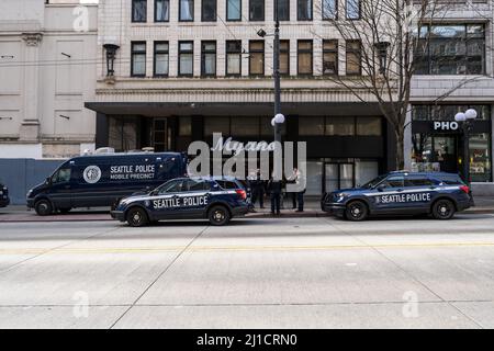 Seattle, USA. 24th Mar, 2022. Seattle police on 3rd and Pine due to an increase in violent crime in downtown. Amazon recently made headlines by telling employees working out of the Ivy building on 3rd and Pine, they can choose another location to work out of until the situation improves. Seattle police have set up a mobile police precinct by the tech giant. James Anderson/Alamy Live News Stock Photo