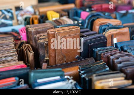 phone cases are sold in a crate on a street market in a market stall Stock Photo