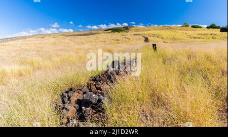 Lava Stone Fence Leading Uphill to Pu'ukohola Heiau National Historic Site, Hawaii Island, Hawaii, USA Stock Photo