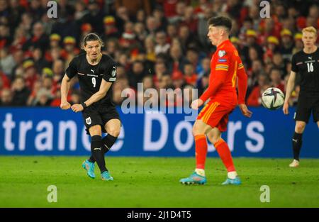 24th March 2022;  Cardiff City Stadium, Cardiff, Wales, 2022 World Cup Qualification football, Wales versus Austria; Marcel Sabitzer of Austria shoots at goal Stock Photo