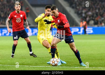 Lille, France - March 16: Hatem Ben Arfa of Lille (R) fights for the ball with Ruben Cheek of Chelsea (L) during the UEFA Champions League Round Of Si Stock Photo