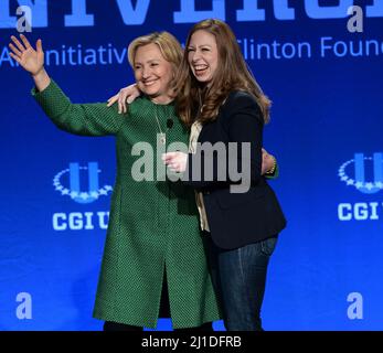 CORAL GABLES, FL - MARCH 07: Hillary Rodham Clinton, Former U.S. Secretary of State and U.S. Senator from New York and her daughter Chelsea Clinton, Vice Chair, Clinton Foundation embr as they attend the 2015 Meeting of Clinton Global Initiative University at the University of Miami on March 7, 2015 in Coral Gables, Florida. The 2015 Clinton Global Initiative University meeting encourages students to take action on some of the Millennial generations biggest concerns such as the future of energy, the power of big data to address global challenges, and pe-building in the Middle East and North Af Stock Photo