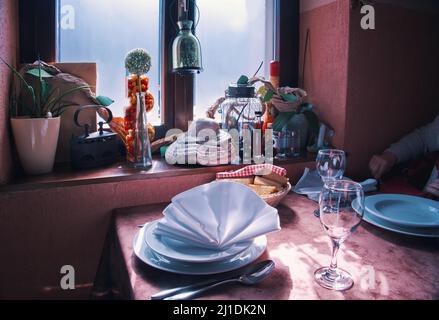 Table in restaurant served for dinner Stock Photo