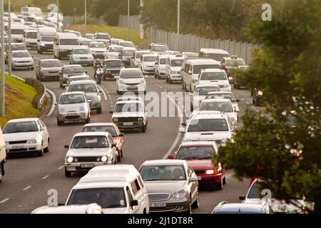 Traffic, the last thing you need after work. Shot of a cars traveling in heavy traffic on the way home from work. Stock Photo