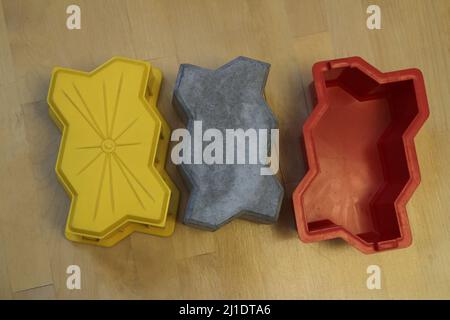 paving slabs and a plastic mold for its manufacture Stock Photo