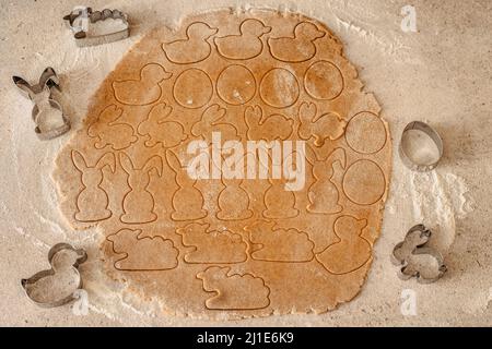 Easter baking flat lay.Spring symbols made from gingerbread.Homemade cookies.Easter bunny,rabbit,eggs and ducks from delicious honey dough.Happy Easte Stock Photo
