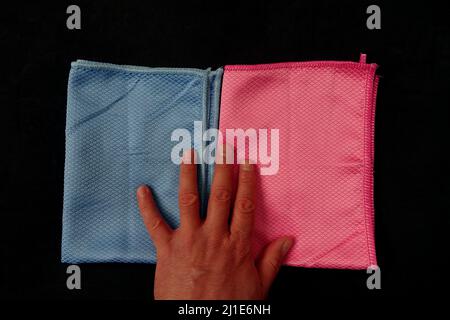 close-up microfiber cleaning cloth,microfiber cleaning cloth in blue and pink colors, Stock Photo