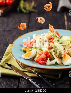 Closeup on fresh caesar salad with shrimp Stock Photo