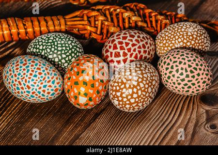 Happy Easter.Colorful hand painted decorated Easter eggs, willow branches. Handmade Easter eggs on wooden table.Spring decoration background. Festive Stock Photo