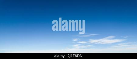 Panorama of blue sky with white foggy clouds Stock Photo