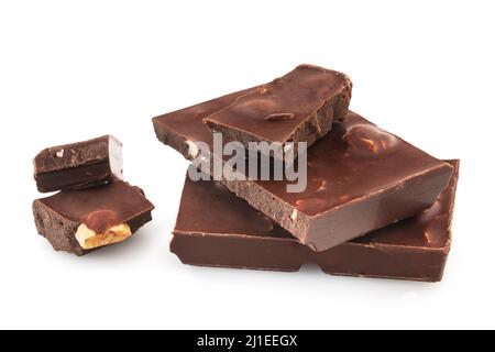 Pieces of dark chocolate bars with nuts isolated on a white background Stock Photo