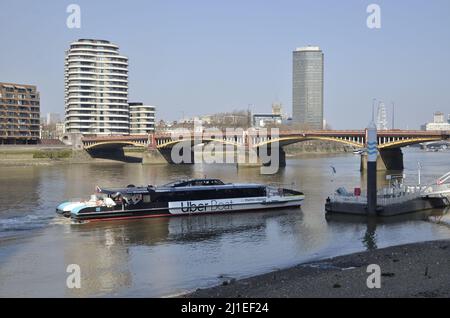 An Uber Boat run by Thames Clippers arriving at St George's Wharf in Vauxhall, London Stock Photo