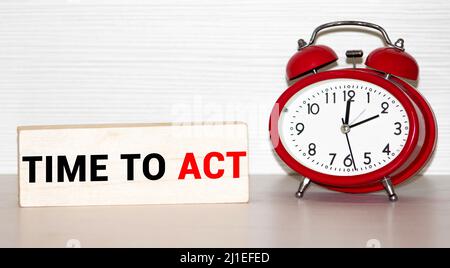 Text sign showing Time To Act. Conceptual photo Do it now Response Immediately Something need to be done Colored clothespin papers empty reminder wood Stock Photo