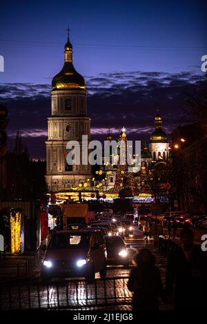The 2022 January lights and view of Christmas tree on Sofia square in Kyiv near the XI-XVIII century St Sofia Bell Tower, Bogdan Khmelnitsky monument Stock Photo