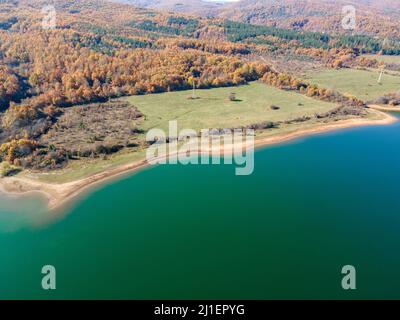 Aerial Autumn view of Izvor Reservoir at Konyavska Mountain, Pernik region, Bulgaria Stock Photo