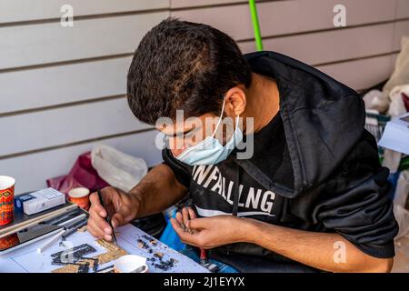 A Young Man Working In A Mosaic Factory, Madaba, Madaba Governorate, Jordan. Stock Photo