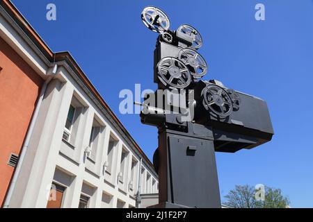 KEDZIERZYN-KOZLE, POLAND - MAY 11, 2021: Movie projector monument in front of Local House of Culture Chemik in Kedzierzyn-Kozle, Poland. Stock Photo