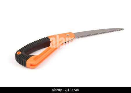Folding garden saw in the folded state isolated on a white background, pocket saw. High resolution photo. Full depth of field. Stock Photo