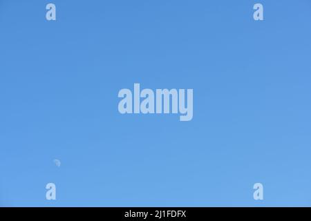 Background of blue sky with moon in the corner. High resolution photo. Stock Photo