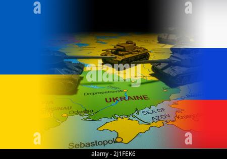 Conflict between Russia and Ukraine. Toy tanks on the map. Stock Photo