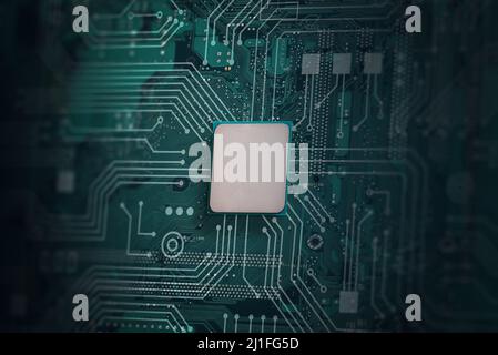 CPU chip and green motherboard with circuit lines. Tehnology concept Stock Photo