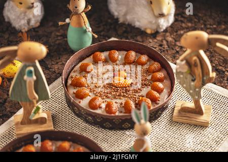 Easter carrot cake decorated with mini caramelized carrots Stock Photo