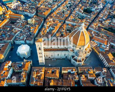 Aerial view of Florence cathedral, view of the Duomo with its Brunelleschi designed dome sited in the center of the city of Florence against Tuscany h Stock Photo