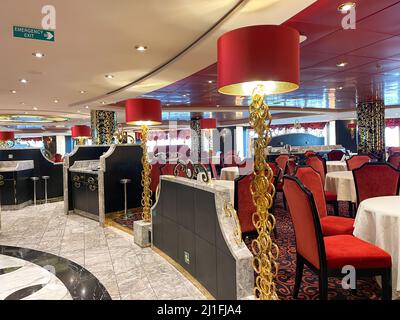 Orlando, FL USA - October 10, 2021:  The  Formal Dining Room on the MSC Cruise Ship Divina in Port Canaveral, Florida. Stock Photo