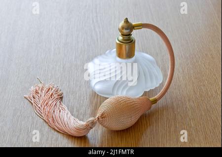 Old fashioned perfume spray Stock Photo