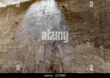 King Seti I, with an Inmutef priest, making an offering of incense, the Great Temple of Abydos, Egypt Stock Photo