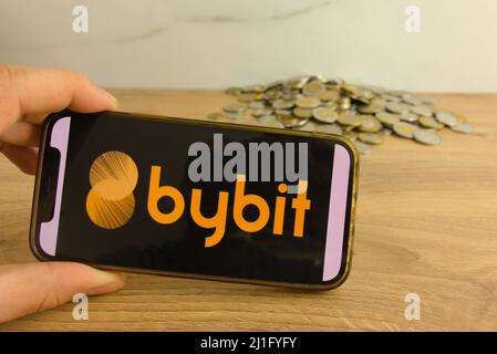 KONSKIE, POLAND - March 20, 2022: Bybit cryptocurrency exchange logo on mobile phone. Online trading, blockchain technology concept Stock Photo