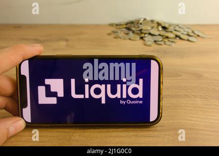 KONSKIE, POLAND - March 20, 2022: Liquid cryptocurrency exchange logo on mobile phone. Online trading, blockchain technology concept Stock Photo