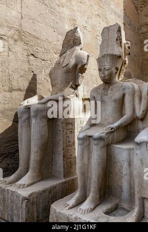 Damaged statues in the Courtyard of Rameses II, Luxor Temple Stock Photo