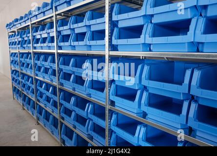 Tool Storage Box and Tool Chests Protective cases for tools and devices. blue plastic Storage boxes on Shelf for accessories or tools set in home offi Stock Photo
