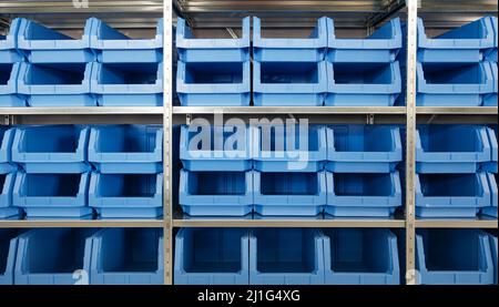 Tool Storage Box and Tool Chests Protective cases for tools and devices. blue plastic Storage boxes on Shelf for accessories or tools set in home offi Stock Photo