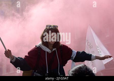 Rome, Italy. 25th Mar, 2022. A protester waving a flag during the demonstration. Climate activists held a demonstration organized by Fridays For Future, as part of the Global Climate Strike calling for action against climate change. Credit: SOPA Images Limited/Alamy Live News Stock Photo