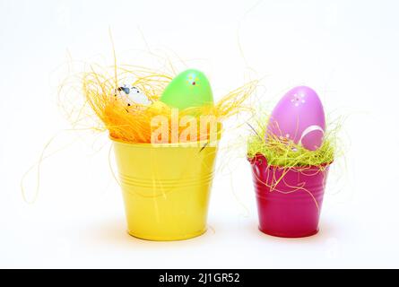Easter eggs and chickens on white isolated background Stock Photo