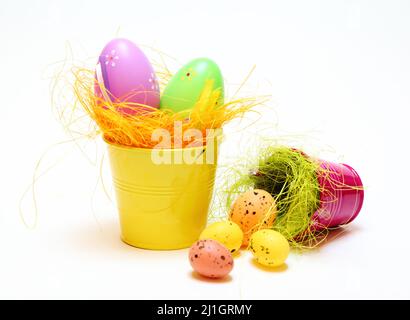 Easter eggs and chickens on white isolated background Stock Photo
