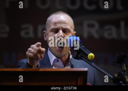 Loyalist blogger Jamie Bryson speaks during a anti Northern Ireland Protocol rally and parade, organised by North Antrim Amalgamated Orange Committee, in Ballymoney, Co Antrim. Picture date: Friday March 25, 2022.