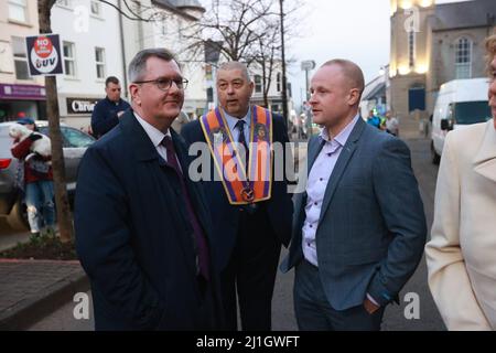(left to right) Sir Jeffrey Donaldson, John McGregor and Loyalist blogger Jamie Bryson speaks during a anti Northern Ireland Protocol rally and parade, organised by North Antrim Amalgamated Orange Committee, in Ballymoney, Co Antrim. Picture date: Friday March 25, 2022.