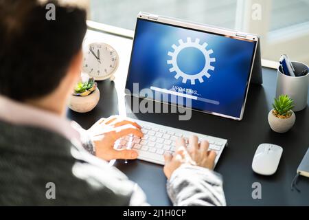 Business Computer Online Update. Software Upgrade Progress Stock Photo